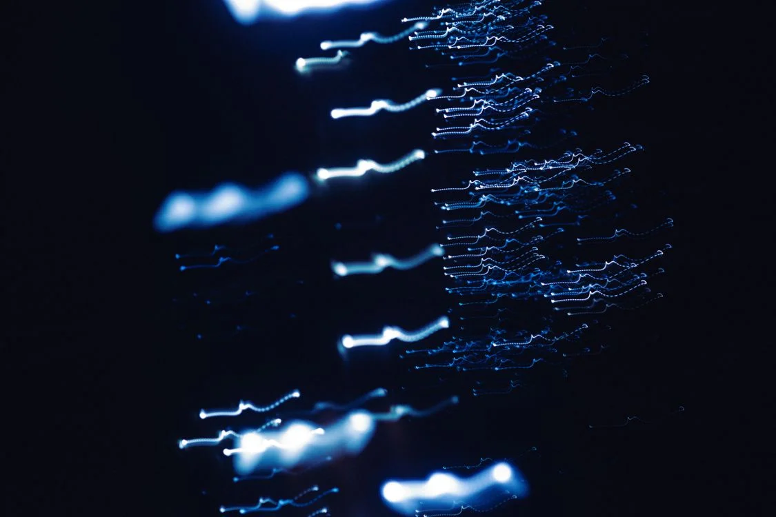 Blue light trails in motion against a dark background, representing the hidden cost of rebuilding context on every client engagement