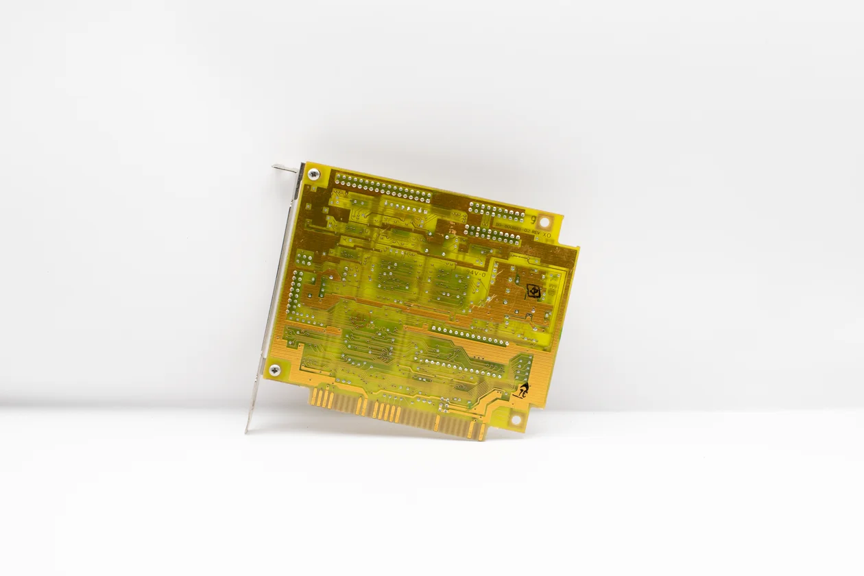 Detailed close-up of a circuit board with intricate components, representing an AI knowledge base for consultants built framework-first so it sharpens as you use it