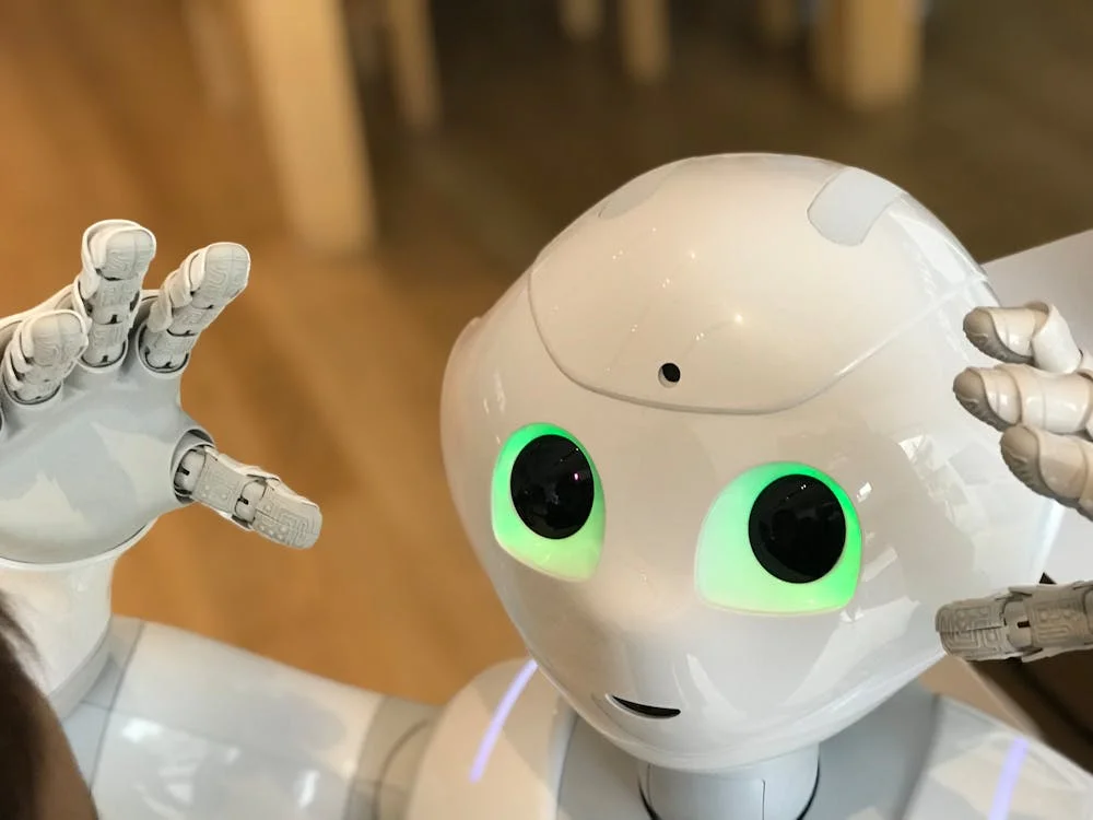 Futuristic humanoid robot with glowing eyes, representing AI that applies one consultant’s methodology to every client in an isolated workspace