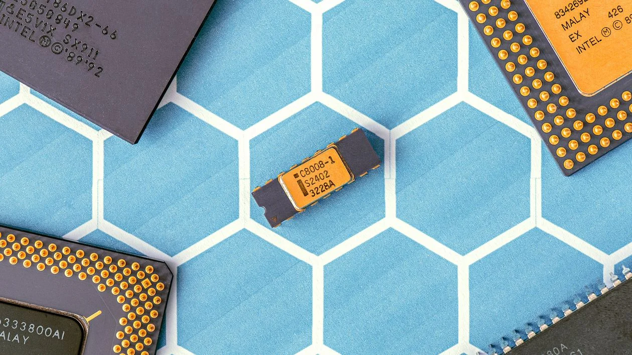 Vintage Intel processors arranged on a blue hexagonal surface, representing the question of whether Google Gemini is safe for confidential client work