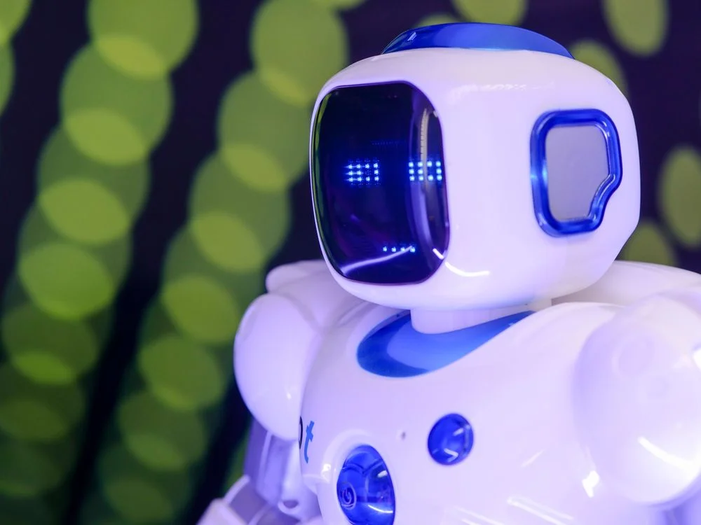 Humanoid robot with glowing blue features, representing AI for agency client onboarding that applies one methodology to every new client