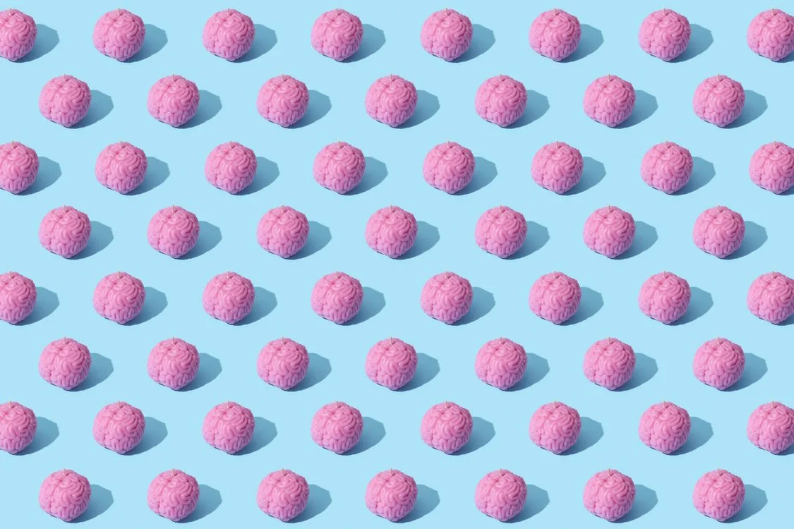 Repeating pattern of brain models, representing one centralized AI brain applied across many clients in a service business
